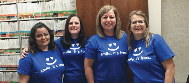 Group of women volunteering at Dentistry from the heart event