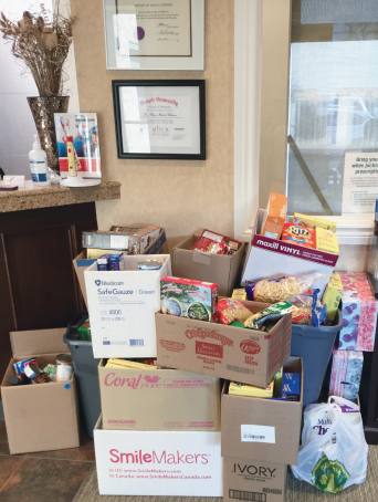 Large number of stacked boxes with donated food items