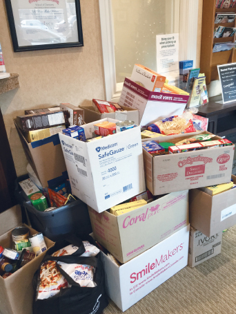 Stack of boxes containing donated food items for food bank